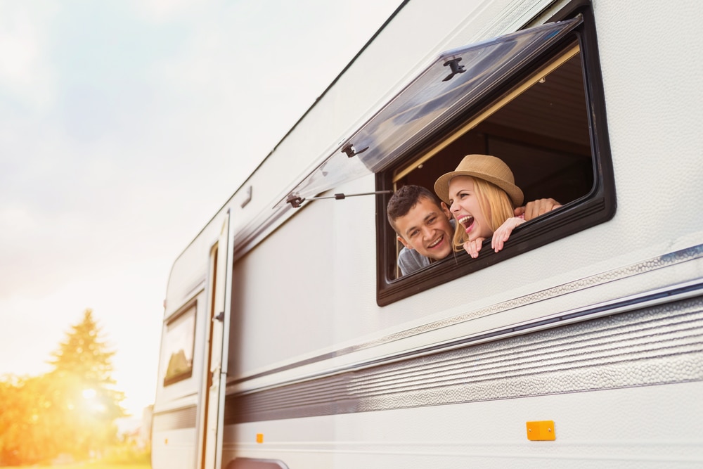 Happy couple in a caravan